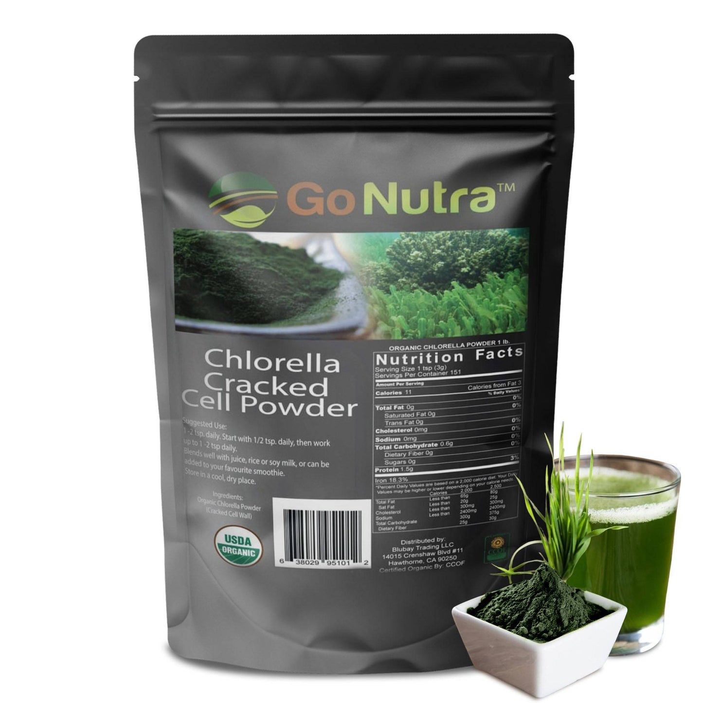 a bag of green tea next to a cup of green tea